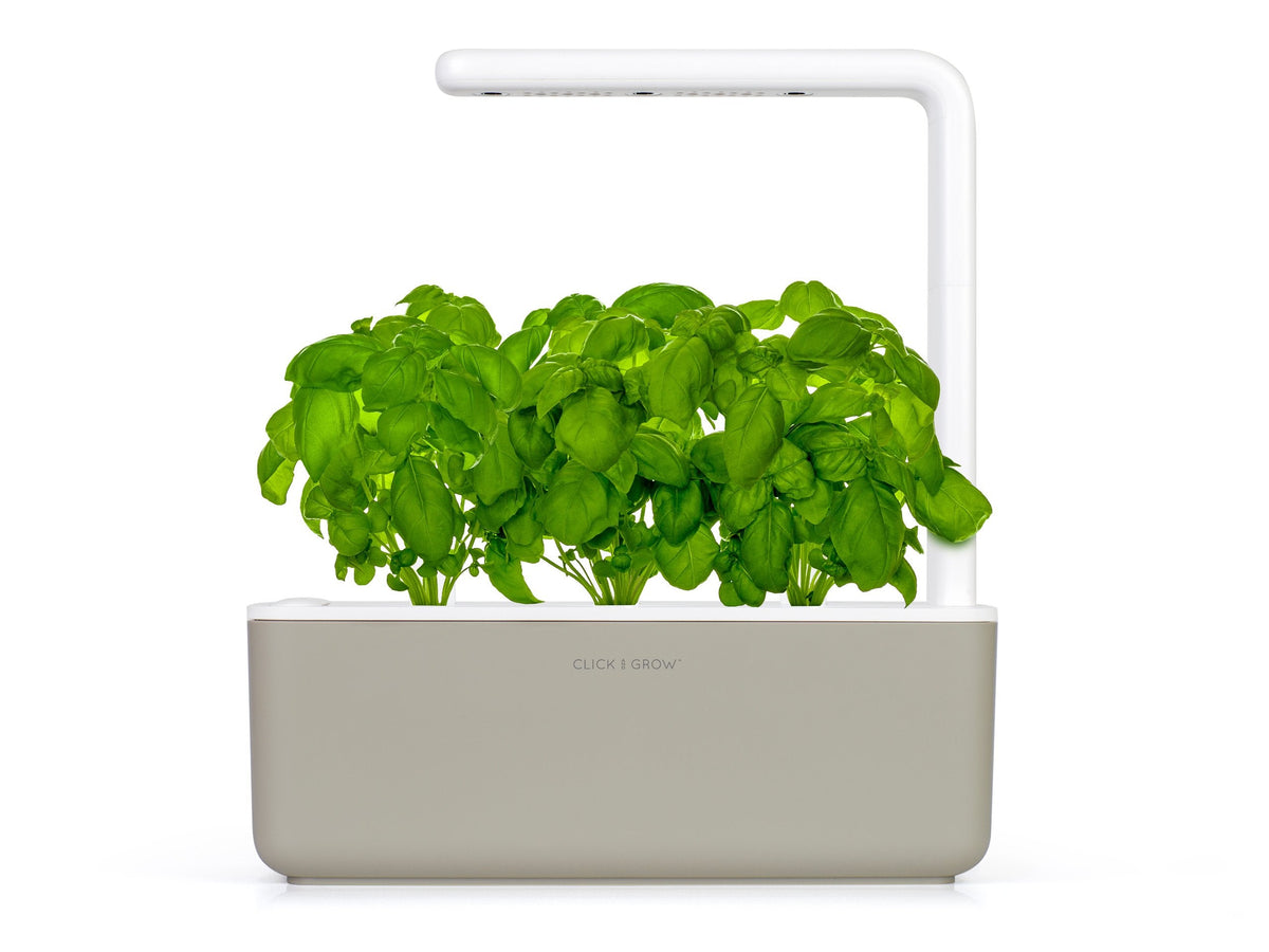 Grow herbs all year round with a smart indoor garden. Grow fresh basil, fresh cilantro and many more with the Click & Grow plant growing kit called the smart indoor garden. The best gift for plant lover!