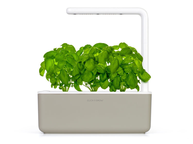 Grow herbs all year round with a smart indoor garden. Grow fresh basil, fresh cilantro and many more with the Click & Grow plant growing kit called the smart indoor garden. The best gift for plant lover!